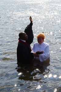Wife getting baptized